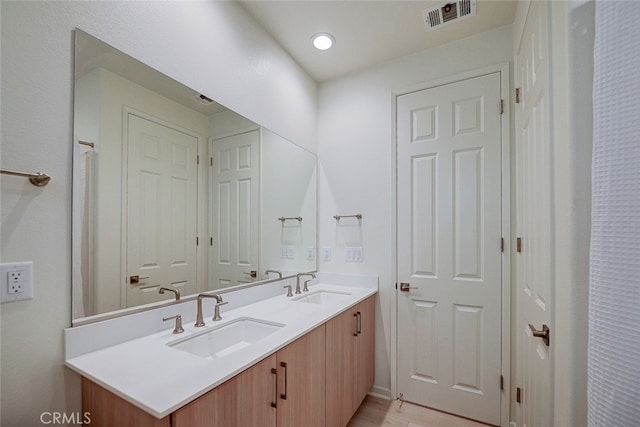 bathroom featuring vanity