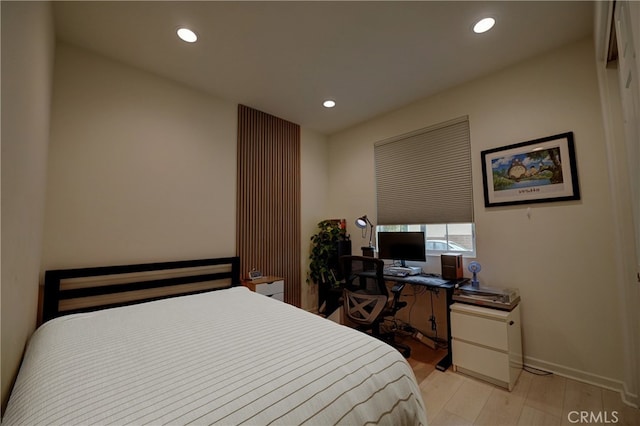 bedroom featuring light hardwood / wood-style floors