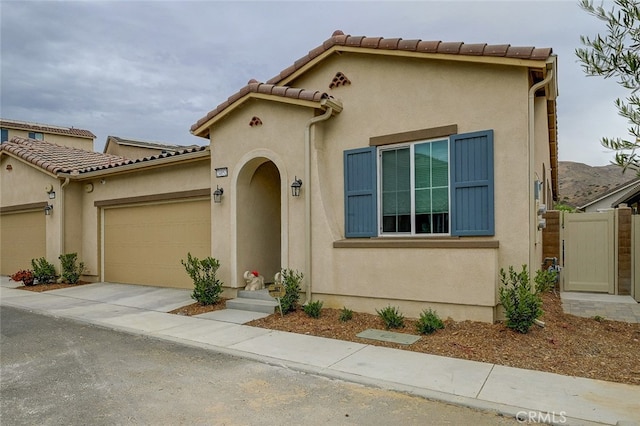 view of front of property with a garage