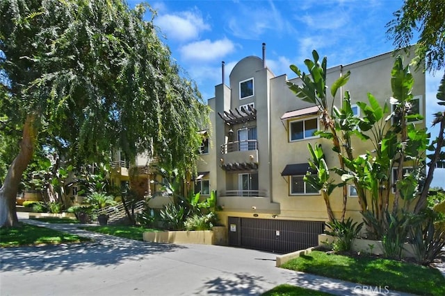 view of property featuring a garage