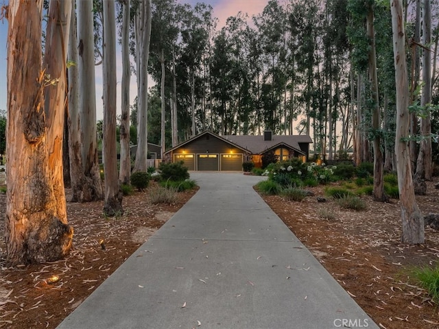 ranch-style house featuring a garage