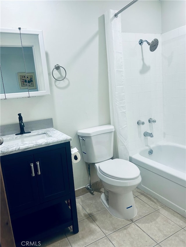 full bathroom with tile patterned floors, shower / bath combo, vanity, and toilet