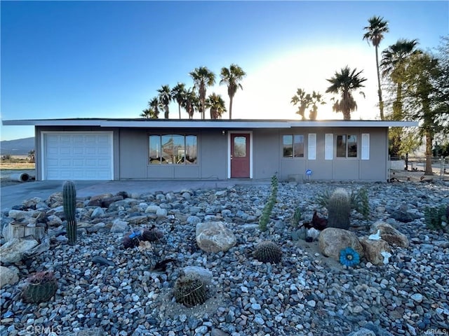 single story home featuring a garage