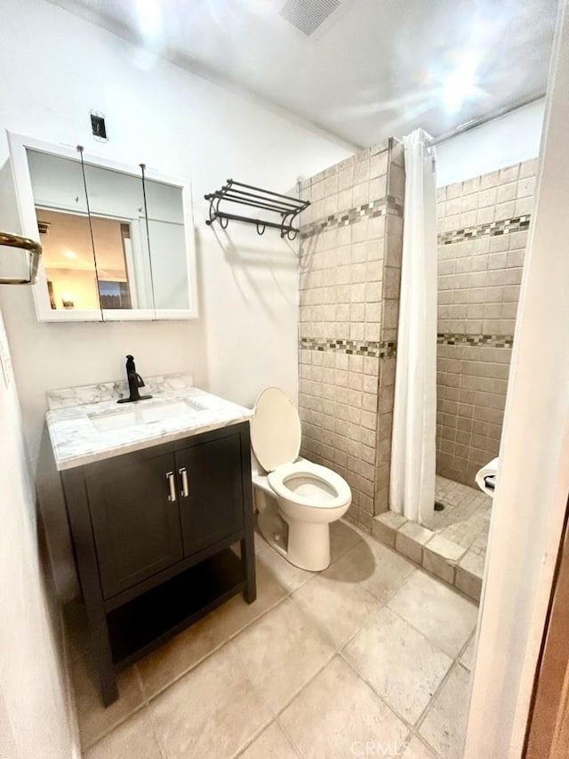 3192 Slice Ct, Borrego Springs, CA 92004 - full bathroom with toilet, tile patterned flooring, a shower stall, and vanity