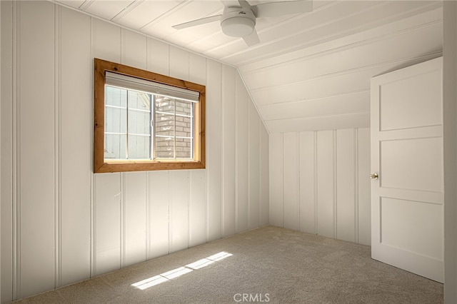 bonus room featuring carpet, vaulted ceiling, and ceiling fan