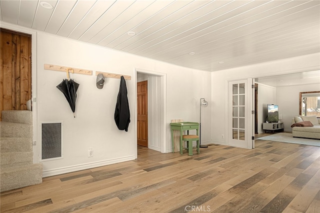 mudroom with wood ceiling and hardwood / wood-style floors