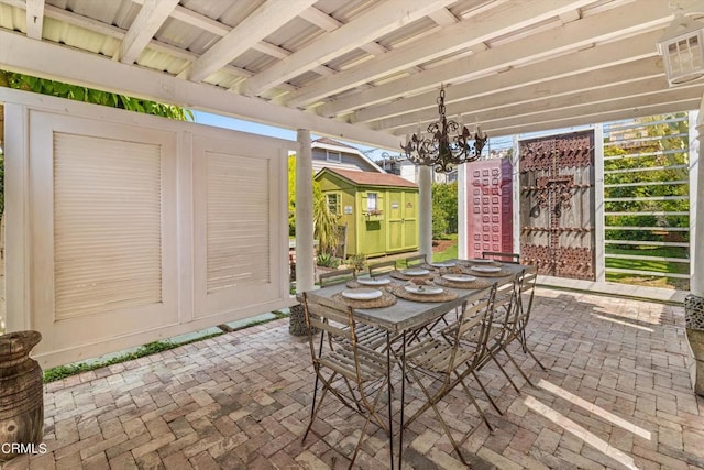 view of patio / terrace featuring a storage shed