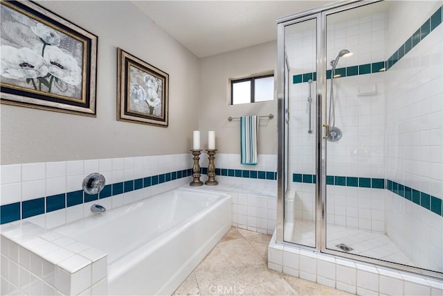 bathroom featuring tile patterned flooring and plus walk in shower