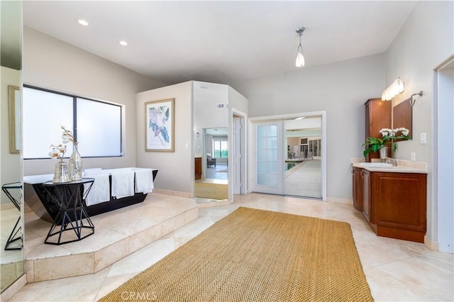 bathroom featuring tile patterned floors and vanity