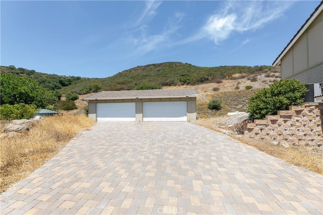 exterior space featuring a mountain view