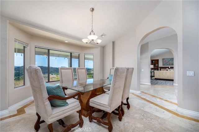 dining room with an inviting chandelier