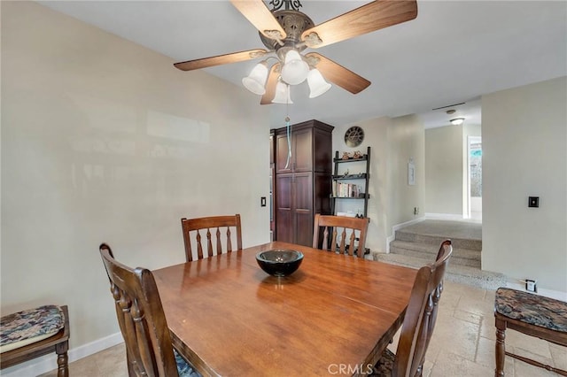 dining space with ceiling fan