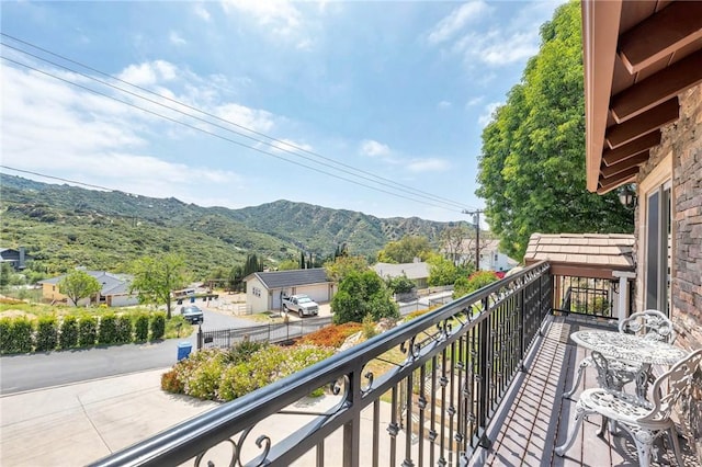 balcony featuring a mountain view