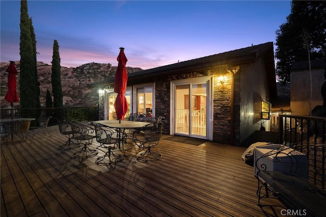 view of deck at dusk