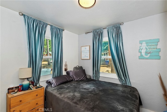 bedroom featuring a textured ceiling