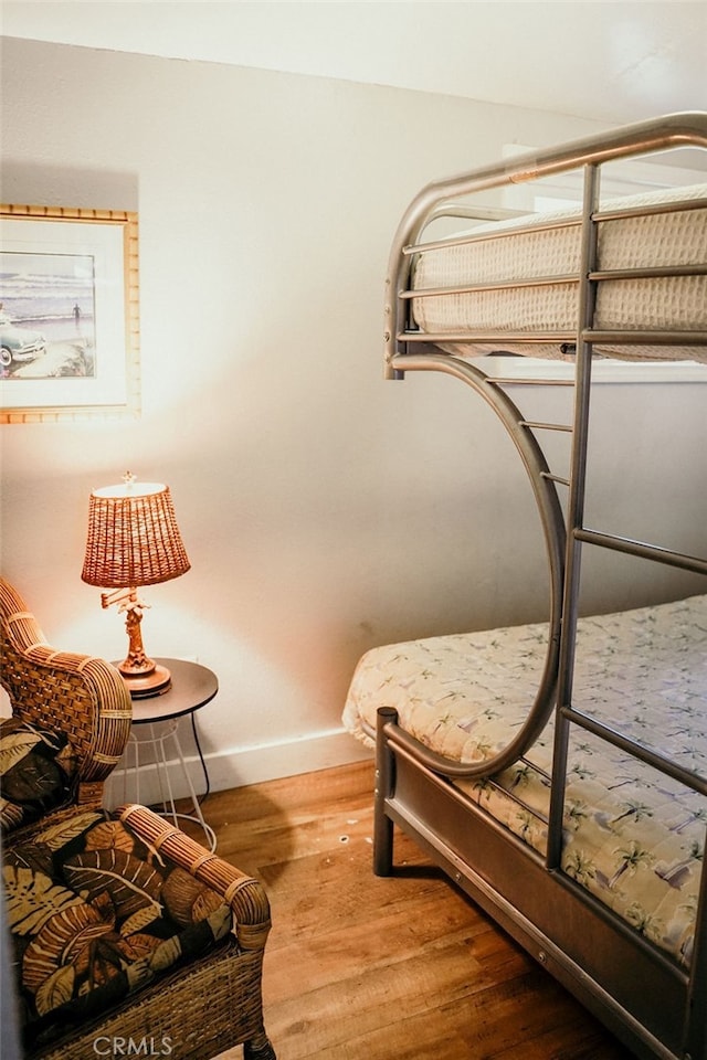 bedroom featuring hardwood / wood-style flooring