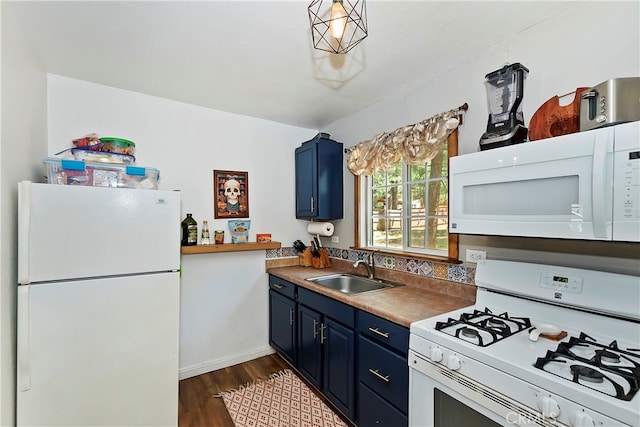 kitchen featuring white appliances, sink, blue cabinets, and dark wood-type flooring