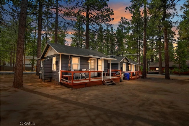 view of front of house with a deck