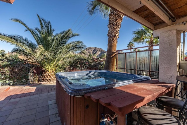 view of patio featuring a hot tub