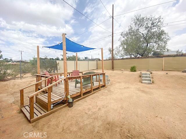 61974 Terrace Dr, Joshua Tree, CA 92252 - view of playground featuring a deck
