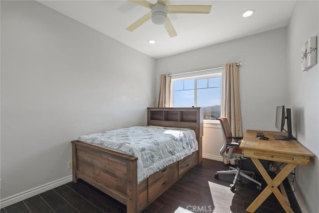 bedroom with ceiling fan and dark hardwood / wood-style floors