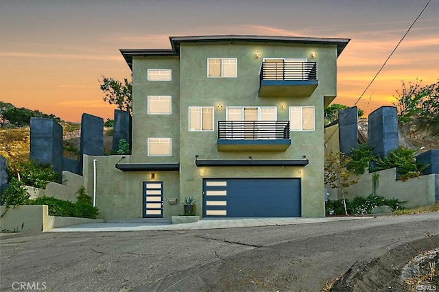 modern home featuring a garage