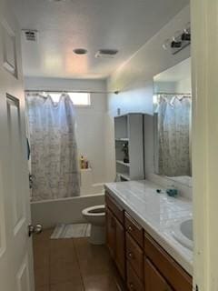 53209 Trailing Rose Dr, Lake Elsinore, CA 92532 - full bathroom with toilet, tile patterned floors, vanity, and shower / tub combo with curtain