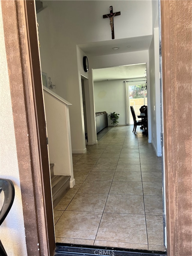 corridor featuring tile patterned flooring