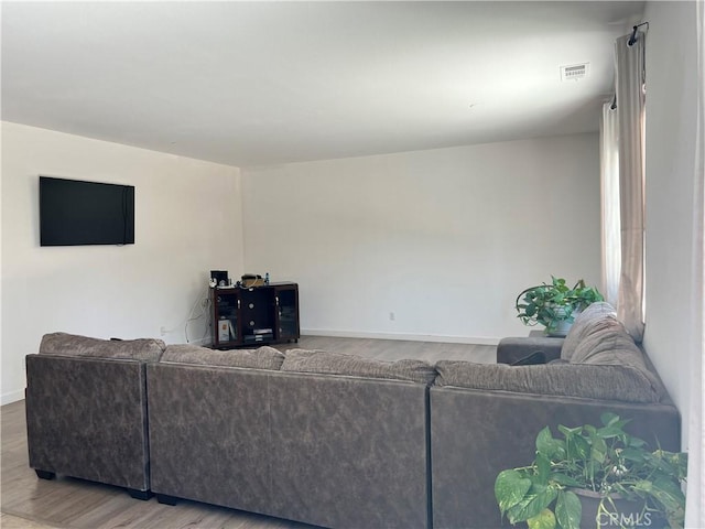 53209 Trailing Rose Dr, Lake Elsinore, CA 92532 - living area with wood finished floors and baseboards