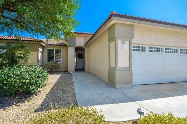 view of front of property with a garage