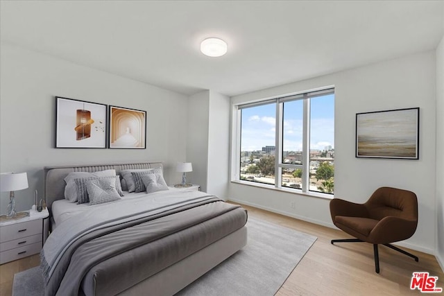 bedroom featuring light hardwood / wood-style floors