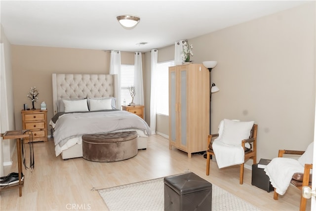 bedroom featuring light hardwood / wood-style flooring