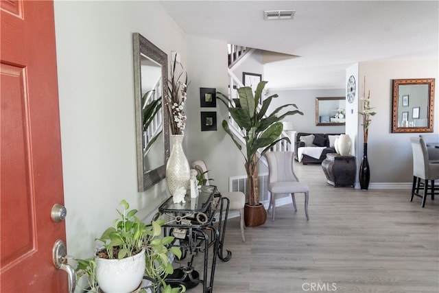 entrance foyer featuring light hardwood / wood-style floors