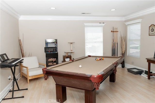 game room with ornamental molding, light wood-type flooring, and billiards