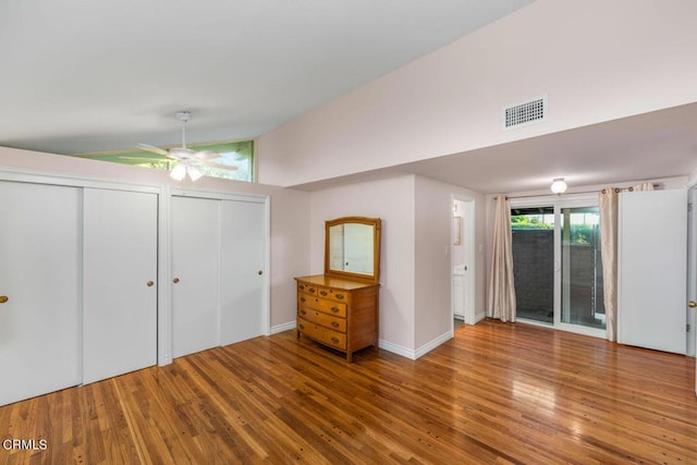 interior space featuring hardwood / wood-style floors, ceiling fan, and lofted ceiling