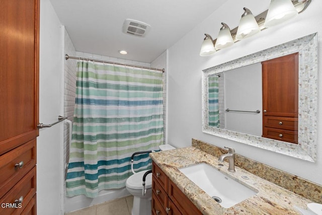 full bathroom with tile patterned flooring, vanity, shower / bath combination with curtain, and toilet