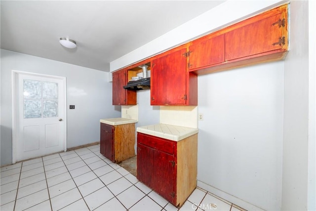 10925 Post Office Rd A/B, Unit A/B, Lucerne Valley, CA 92356 - kitchen with tile countertops, light tile patterned floors, and baseboards