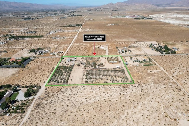 10925 Post Office Rd A/B, Unit A/B, Lucerne Valley, CA 92356 - aerial overview of property's location with mountains, rural landscape, and property boundaries highlighted