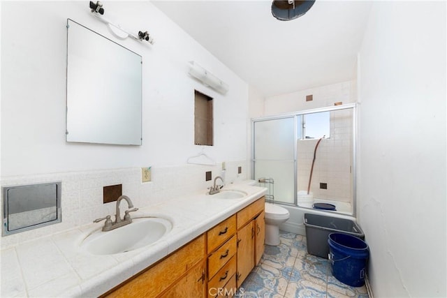 10925 Post Office Rd A/B, Unit A/B, Lucerne Valley, CA 92356 - full bath featuring toilet, double vanity, combined bath / shower with glass door, and tile patterned flooring
