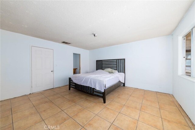 10925 Post Office Rd A/B, Unit A/B, Lucerne Valley, CA 92356 - bedroom with light tile patterned flooring