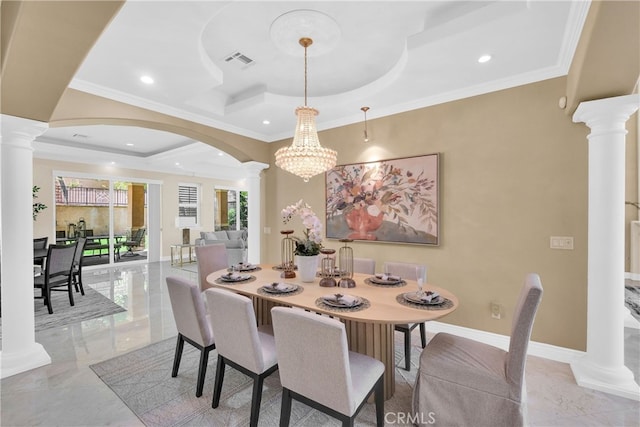 dining space with an inviting chandelier, crown molding, and decorative columns