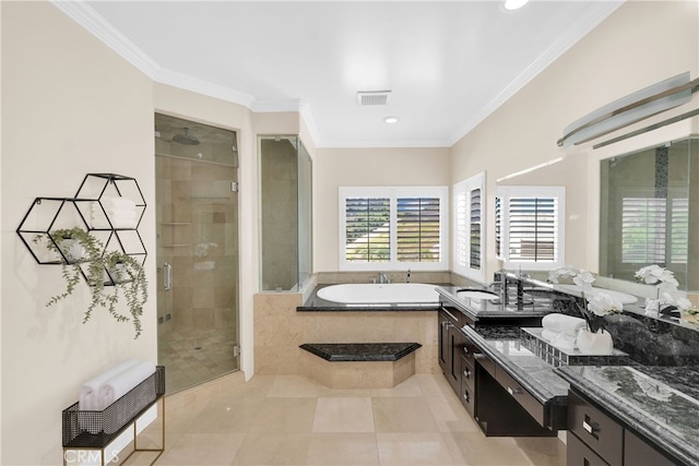 bathroom featuring independent shower and bath, vanity, ornamental molding, and tile patterned floors