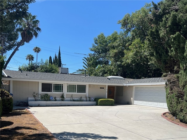 single story home with a garage