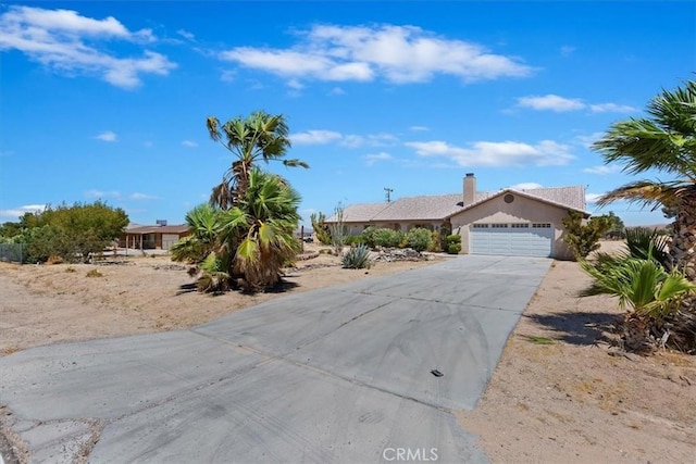 single story home featuring a garage