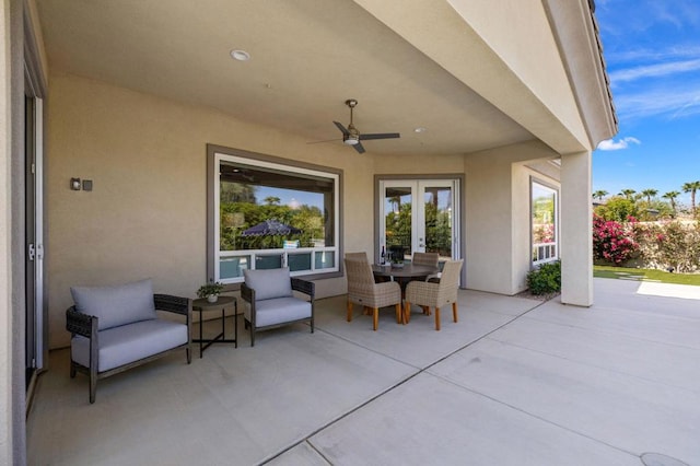 view of patio / terrace with ceiling fan and french doors