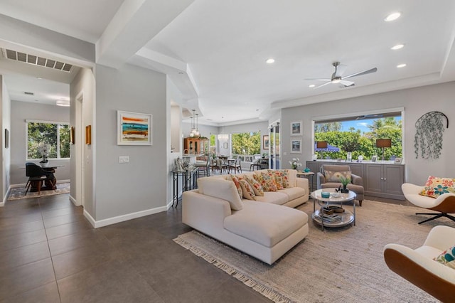 living room featuring ceiling fan