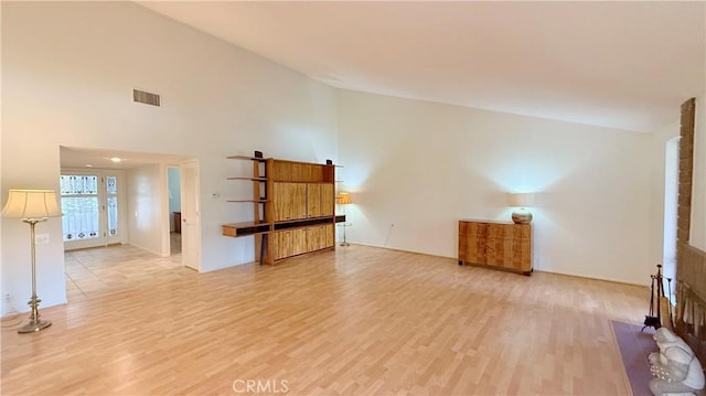 unfurnished living room with light hardwood / wood-style flooring