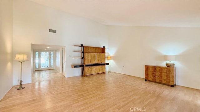 unfurnished living room featuring light hardwood / wood-style floors