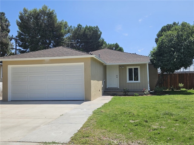 single story home with a front lawn and a garage