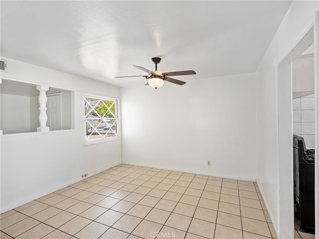 interior space featuring ceiling fan